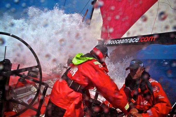 The crew on CAMPER prepare for a soaking